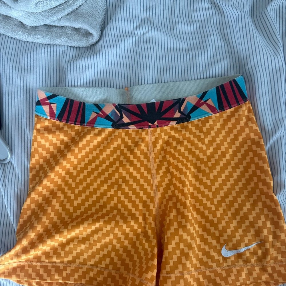 Nike Women's Zigzag Orange Athletic Shorts